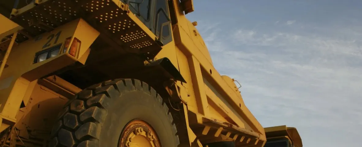 Tanzanian landscape with traditional and large-scale mining infrastructure